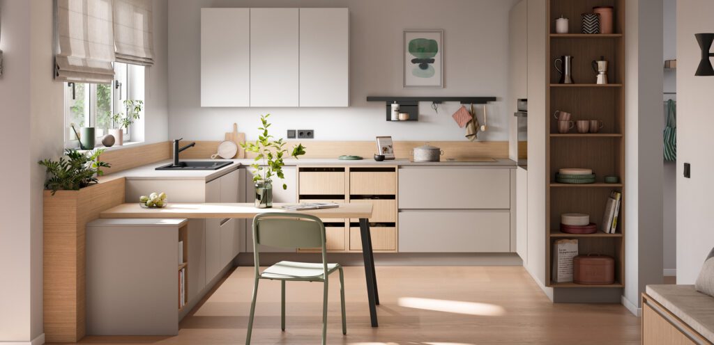 Helle L-Küche in Beige/Grau mit hellem Holzdekor und integriertem Esstisch.
