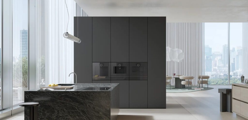 Schwarze Inselküche mit Granit-Insel und Minimalitic Einbaugeräte von Gaggenau
