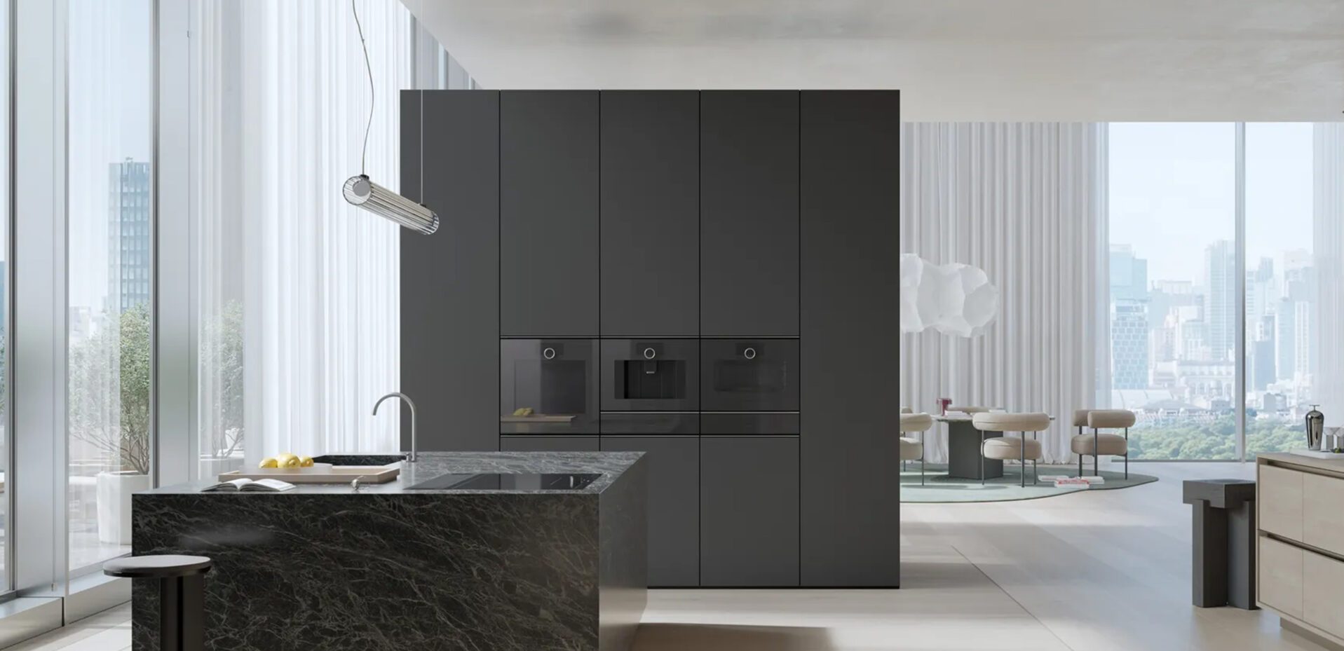 Schwarze Inselküche mit Granit-Insel und Minimalitic Einbaugeräte von Gaggenau