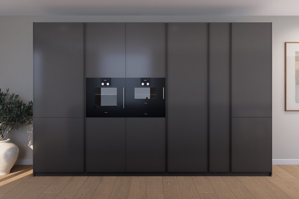 Raumhohe, dunkelgraue Schrankwand mit zwei integrierten Backöfen.