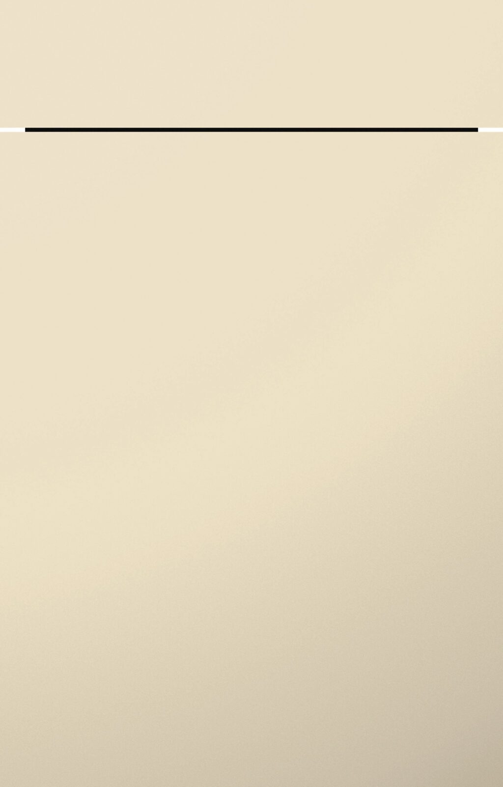 Matte Küchenfront im sanften Farbton Crema-Magnolie mit dezenter Griffmulde.